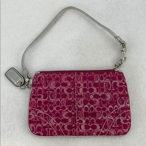Coach signature patterned wristlet